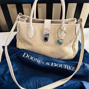 Dooney & Bourke cream canvas and white leather crossbody bag